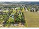 Aerial view of a property with red boundary lines on an irregular shaped parcel adjacent to a lavender field at 3217 Mott Rd, Dover, FL 33527