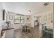 Cozy dining area with a window and stylish light fixture, perfect for meals at 3217 Mott Rd, Dover, FL 33527