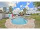 Wonderful pool area with an in-ground pool, spa, sunny patio, and partially fenced yard with room to roam at 3217 Mott Rd, Dover, FL 33527