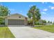 Single story home features mature landscaping and a stone and stucco front at 3226 Gardenia Dr, Hernando Beach, FL 34607