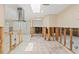 Spacious, brightly lit kitchen area with tile floor and range hood, ready for remodel at 3226 Gardenia Dr, Hernando Beach, FL 34607
