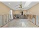 Unfinished room with large skylight, ceiling fan, water view window, and adjoining bathroom at 3226 Gardenia Dr, Hernando Beach, FL 34607