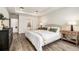 Relaxing bedroom featuring a serene view with stylish bedside tables and soft decor at 33774 Castaway Loop, Wesley Chapel, FL 33543