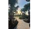 The sun sets over the lush community landscaping at 33774 Castaway Loop, Wesley Chapel, FL 33543