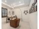 Home office featuring a desk, chair, and ample natural light at 33774 Castaway Loop, Wesley Chapel, FL 33543