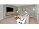 Cozy living area with stylish furnishings, including a comfortable sectional and modern lighting at 3420 Timber Crossing Ave, Brandon, FL 33511