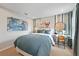 Modern bedroom featuring a desk, blue color scheme, and carpeted floors at 3424 Timber Crossing Ave, Brandon, FL 33511
