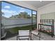Screened patio features stone pavers and chairs, offering an outdoor living space at 3424 Timber Crossing Ave, Brandon, FL 33511