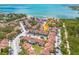 Beautiful aerial shot showcasing bayfront community, colorful buildings, and ample parking at 3595 41St S Ln # L, St Petersburg, FL 33711