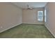 Cozy bedroom featuring a ceiling fan, natural light and ample space for relaxation at 3634 Springville Dr, Valrico, FL 33596
