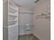 Walk-in closet with built-in shelving and drawers, offering ample storage space at 3634 Springville Dr, Valrico, FL 33596