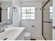 Clean bathroom featuring a large vanity, modern fixtures, and a glass enclosed shower at 3865 Gatewood Dr, Sarasota, FL 34232