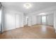 Bright and spacious bedroom with wood-look tile flooring and ample natural light at 3865 Gatewood Dr, Sarasota, FL 34232