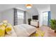 Cozy bedroom with bright accents and lots of natural light at 3865 Gatewood Dr, Sarasota, FL 34232