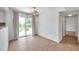 Dining area with sliding door access to the backyard and modern light fixture at 3865 Gatewood Dr, Sarasota, FL 34232