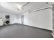 Spacious garage featuring laundry hookups, ample storage space, and neutral flooring at 3865 Gatewood Dr, Sarasota, FL 34232