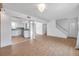 Open living space with modern kitchen view and staircase at 3865 Gatewood Dr, Sarasota, FL 34232