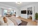 Spacious main bedroom with wood floors, large windows and an ample closet at 3865 Gatewood Dr, Sarasota, FL 34232