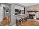 Breakfast bar featuring stools and access to kitchen area at 395 Forest Park Rd, Oldsmar, FL 34677