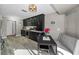 Kitchen with stainless steel appliances and an adjacent breakfast nook with backyard views at 395 Forest Park Rd, Oldsmar, FL 34677