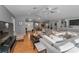 Spacious open floor plan with living room, dining room, and kitchen at 395 Forest Park Rd, Oldsmar, FL 34677