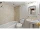 Bathroom featuring a bathtub, tiled shower, sink, and medicine cabinet at 4013 Muriel Pl, Tampa, FL 33614