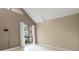 Bedroom with tile floors, high ceilings and a window with curtains at 4013 Muriel Pl, Tampa, FL 33614