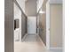 Bright foyer with white marble floors, white trim and neutral walls offers a clean and inviting space at 4013 Muriel Pl, Tampa, FL 33614