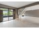 Spacious living room with white tile floors and natural light at 4013 Muriel Pl, Tampa, FL 33614