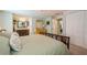 This bedroom features a full ensuite bathroom and a closet with white sliding doors at 4204 Northwind Ln, Tampa, FL 33624