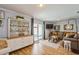 Comfortable living room with wood floors, sliding door to patio, and stylish decor at 4204 Northwind Ln, Tampa, FL 33624
