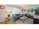 Bright living room with comfortable seating, stylish decor, and ample natural light at 4204 Northwind Ln, Tampa, FL 33624
