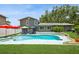 Inviting backyard pool with ample space for entertaining and relaxation at 4204 Northwind Ln, Tampa, FL 33624
