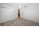 Cozy bedroom features a closet and a soft carpet at 4220 Woodlark Dr, Tampa, FL 33624