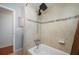 Modern bathroom with a shower head and tiled walls at 4220 Woodlark Dr, Tampa, FL 33624