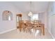 Comfortable dining room featuring modern decor, ample natural light, and hardwood floors at 4368 Las Palmas Ave, Spring Hill, FL 34606