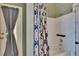 Clean bathroom with shower-tub combo and stylish shower curtain at 4418 River Overlook Dr, Valrico, FL 33596