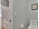 Bathroom featuring toilet, tub with shower, and neutral walls at 4418 River Overlook Dr, Valrico, FL 33596