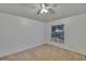 Bright bedroom with carpeted flooring and window for natural light at 4418 River Overlook Dr, Valrico, FL 33596