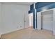 Bedroom featuring carpet floors, a closet and vaulted ceilings at 4418 River Overlook Dr, Valrico, FL 33596