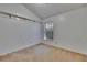 Neutral bedroom with vaulted ceilings and a window at 4418 River Overlook Dr, Valrico, FL 33596