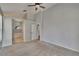 Spacious bedroom with neutral carpet, ensuite bathroom with garden tub, and walk-in closet at 4418 River Overlook Dr, Valrico, FL 33596