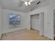 Bright bedroom with natural light and a closet at 4418 River Overlook Dr, Valrico, FL 33596