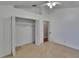 Spacious bedroom with a ceiling fan and closet at 4418 River Overlook Dr, Valrico, FL 33596