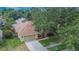 A single-Gathering home featuring a two-car garage and well-maintained lawn at 4418 River Overlook Dr, Valrico, FL 33596