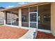 Spacious screened patio with views of the backyard at 4418 River Overlook Dr, Valrico, FL 33596