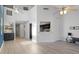 Bright and open living space with wood-look floors, modern fixtures, and water views at 500 New York Ave # 23, Dunedin, FL 34698