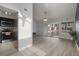 Open-concept living room with water view and easy access to the modern kitchen at 500 New York Ave # 23, Dunedin, FL 34698