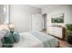 Tastefully staged bedroom featuring natural light, refined decor, and ample closet space at 5160 Loquat Ct, Palm Harbor, FL 34685