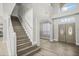 Open foyer with high ceilings and staircase at 5160 Loquat Ct, Palm Harbor, FL 34685